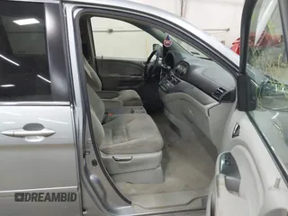 2006 Honda Odyssey EX with VIN 5FNRL38446B044231, listed as a IAAI auction lot 42080586 with 211,908 mi miles. Bid and sale history available at carsss.com. Image 5.