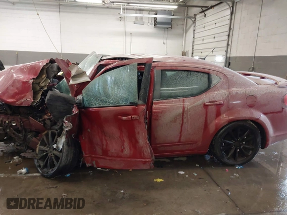 2012 Dodge Avenger SXT with VIN 1C3CDZCB5CN143301, listed as a IAAI auction lot 41632982 with Not Provided miles and . Bid and sale history available at carsss.com. Image 14.