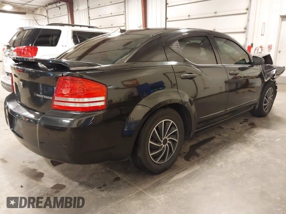 2009 Dodge Avenger SE with VIN 1B3LC46B29N525809, listed as a IAAI auction lot 41918533 with 147,269 mi miles and . Bid and sale history available at carsss.com. Image 4.