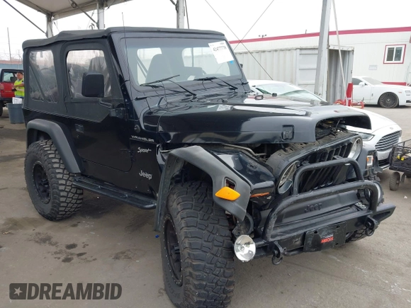 2002 Jeep Wrangler Sport with VIN 1J4FA49S02P705470, listed as a IAAI auction lot 42477770 with 59,395 mi miles and . Bid and sale history available at DreamBid. Image 1.