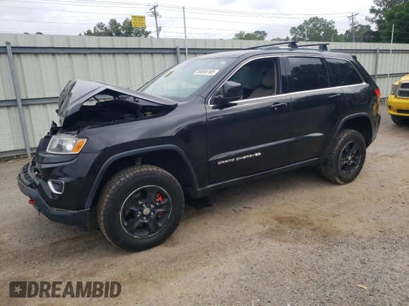 2016 Jeep Grand Cherokee Laredo with VIN 1C4RJEAG4GC394091, listed as a Copart auction lot 56595165 with 134,135 mi miles and Salvage title. Bid and sale history available at DreamBid. Image 1.
