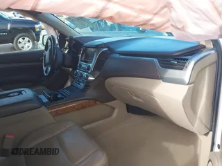 2019 Chevrolet Suburban LT with VIN 1GNSCJKC1KR146104, listed as a IAAI auction lot 41103371 with 108,727 mi miles. Bid and sale history available at carsss.com. Image 5.
