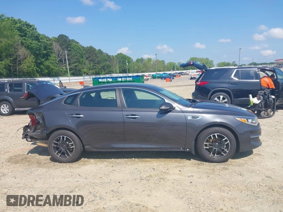 2018 Kia Optima LX z VIN KNAGT4L34J5232346, wystawiony jako IAAI lot #42136524 z przebiegiem 119 977 mil mil oraz . Historia ofert i sprzedaży dostępna na DreamBid. Obrazek 13.