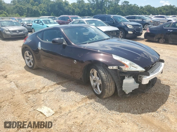 2012 Nissan 370Z Touring with VIN JN1AZ4EH9CM561796, listed as a Copart auction lot 60938314 with 59,011 mi miles and Salvage Title. Bid and sale history available at carsss.com. Image 4.