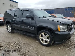 2011 Chevrolet Suburban LT z VIN 1GNSKJE37BR272949, wystawiony jako Copart lot #55329935 z przebiegiem 211 997 mil mil oraz Nie do naprawy • Non repairable. Historia ofert i sprzedaży dostępna na DreamBid. Obrazek 4.
