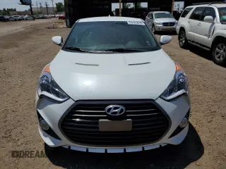 2013 Hyundai Veloster Turbo with VIN KMHTC6AE2DU162790, listed as a Copart auction lot 66404685 with 128,120 mi miles and Clean title. Bid and sale history available at DreamBid. Image 5.