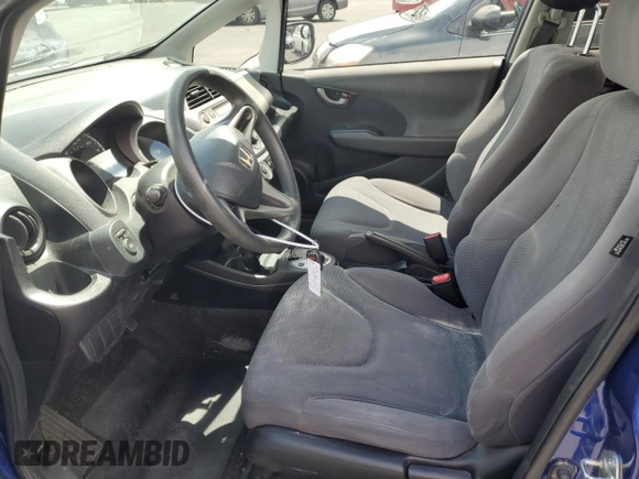 2009 Honda Fit with VIN JHMGE882X9C003678, listed as a Copart auction lot 56688265 with 141,003 mi miles and Salvage title. Bid and sale history available at DreamBid. Image 7.