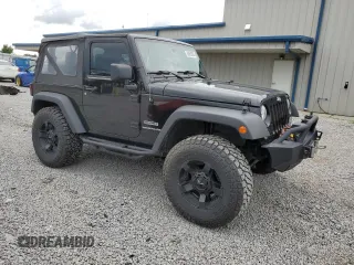 2014 Jeep Wrangler Sport with VIN 1C4AJWAG5EL326480, listed as a Copart auction lot 60653955 with 94,102 mi miles and Salvage title. Bid and sale history available at DreamBid. Image 4.