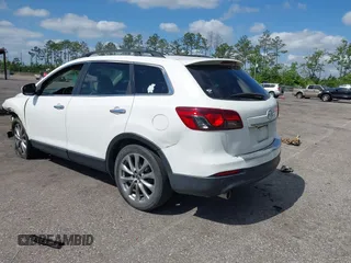 2014 Mazda CX-9 Grand Touring with VIN JM3TB2DA8E0436650, listed as a IAAI auction lot 42147525 with 124,179 mi miles and . Bid and sale history available at DreamBid. Image 3.