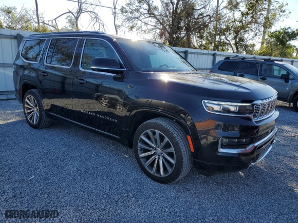 2023 Jeep Grand Wagoneer Series II with VIN 1C4SJVFP5PS569755, listed as a Copart auction lot 82088704 with 23,060 mi miles and Salvage Title. Bid and sale history available at carsss.com. Image 4.