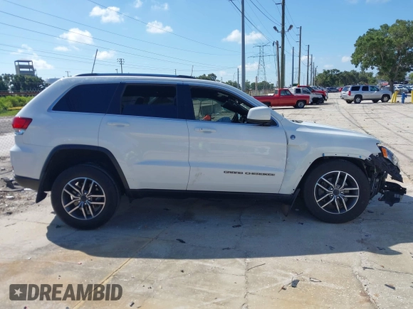 2020 Jeep Grand Cherokee Laredo with VIN 1C4RJFAG5LC258309, listed as a IAAI auction lot 42573007 with 68,980 mi miles and . Bid and sale history available at DreamBid. Image 13.