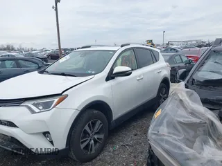 2018 Toyota RAV4 XLE with VIN JTMRFREV8JJ225065, listed as a IAAI auction lot 41940678 with 145,074 mi miles. Bid and sale history available at carsss.com. Image 14.