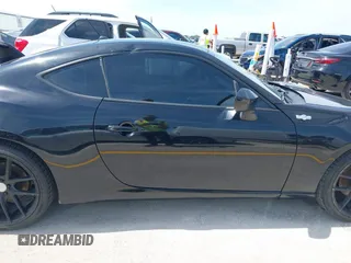 2014 Scion FR-S z VIN JF1ZNAA10E8703778, wystawiony jako IAAI lot #42264695 z przebiegiem 117 889 mil mil oraz . Historia ofert i sprzedaży dostępna na DreamBid. Obrazek 13.