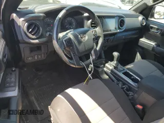 2018 Toyota Tacoma SR with VIN 3TMCZ5AN6JM129370, listed as a Copart auction lot 63042425 with 65,189 mi miles and Salvage title. Bid and sale history available at DreamBid. Image 8.
