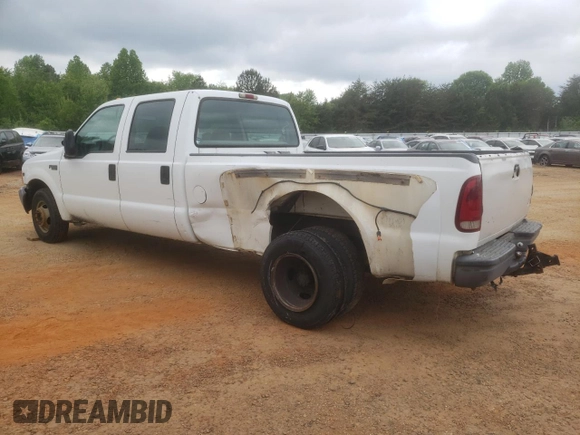 1999 Ford F-350 XL with VIN 1FTWW32FXXEB79284, listed as a Copart auction lot 53969905 with 241,082 mi miles and Salvage title. Bid and sale history available at DreamBid. Image 2.