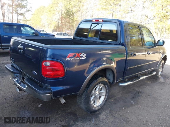 2002 Ford F-150 XLT with VIN 1FTRW086X2KE17566, listed as a IAAI auction lot 41721236 with 98,524 mi miles. Bid and sale history available at carsss.com. Image 4.
