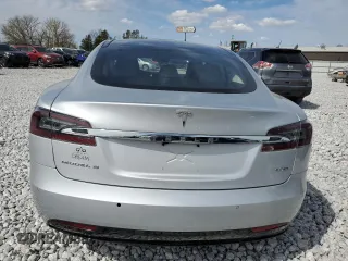 2016 Tesla Model S 90D with VIN 5YJSA1E25GF142104, listed as a Copart auction lot 50874815 with 84,917 mi miles and Salvage Title. Bid and sale history available at DreamBid. Image 6.