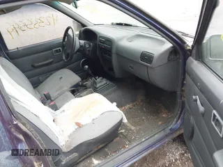 1995 Nissan Frontier XE with VIN 1N6SD11Y4SC318791, listed as a IAAI auction lot 42335599 with Not provided miles and . Bid and sale history available at DreamBid. Image 5.