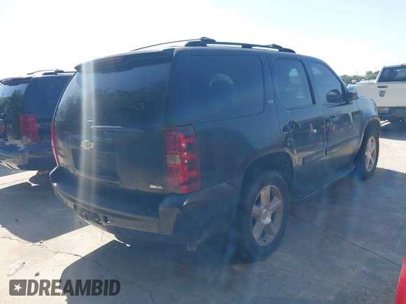 2007 Chevrolet Tahoe LT with VIN 1GNFK13057R278556, listed as a IAAI auction lot 42704704 with 314,650 mi miles and . Bid and sale history available at DreamBid. Image 4.