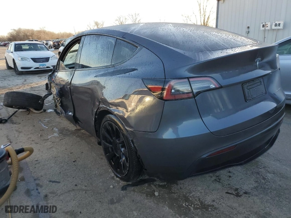 2023 Tesla Model Y Long Range with VIN 7SAYGAEE3PF849918, listed as a Copart auction lot 43078005 with 20,221 mi miles and Salvage Title. Bid and sale history available at carsss.com. Image 2.
