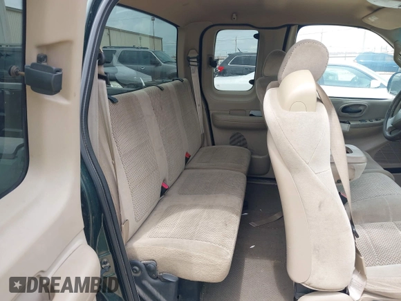 2001 Ford F-150 XL with VIN 1FTZX07271KB88709, listed as a IAAI auction lot 42599181 with 153,985 mi miles and . Bid and sale history available at DreamBid. Image 8.