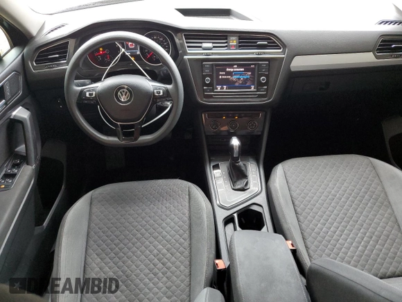 2018 Volkswagen Tiguan S with VIN 3VV1B7AXXJM054778, listed as a Copart auction lot 61294795 with 87,330 mi miles and Salvage title. Bid and sale history available at DreamBid. Image 8.