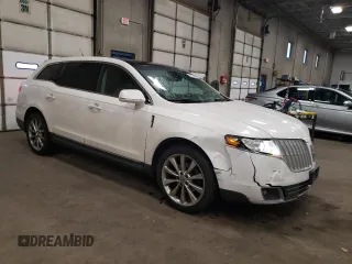2012 Lincoln MKT EcoBoost with VIN 2LMHJ5AT7CBL55076, listed as a Copart auction lot 86120444 with 148,387 mi miles and Salvage Title. Bid and sale history available at DreamBid. Image 4.