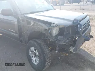 2014 Toyota Tacoma with VIN 3TMLU4EN3EM151545, listed as a IAAI auction lot 41821451 with 261,311 mi miles. Bid and sale history available at carsss.com. Image 6.