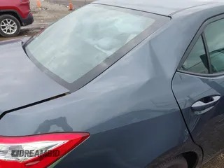 2016 Toyota Corolla L z VIN 5YFBURHE1GP462682, wystawiony jako IAAI lot #42440995 z przebiegiem 105 977 mil mil oraz . Historia ofert i sprzedaży dostępna na DreamBid. Obrazek 6.