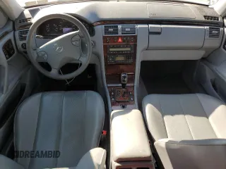 2001 Mercedes-Benz E-Class AWD with VIN WDBJH82J11X056425, listed as a Copart auction lot 48612975 with 130,900 mi miles and Salvage Title. Bid and sale history available at carsss.com. Image 8.