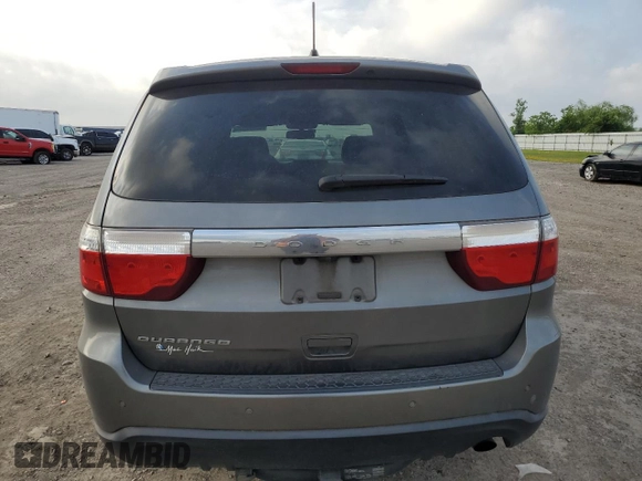 2012 Dodge Durango SXT with VIN 1C4RDHAG9CC335430, listed as a Copart auction lot 55495995 with 210,063 mi miles and Salvage title. Bid and sale history available at DreamBid. Image 6.