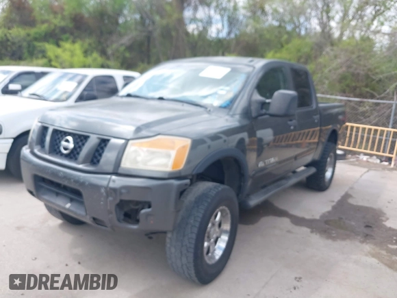 2011 Nissan Titan Pro-4X with VIN 1N6BA0EC3BN320795, listed as a IAAI auction lot 41868113 with 183,919 mi miles and . Bid and sale history available at DreamBid. Image 20.
