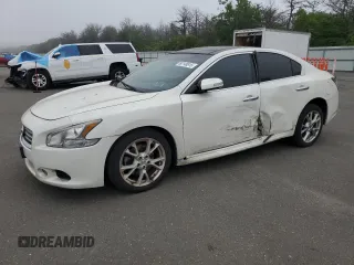 2013 Nissan Maxima SV with VIN 1N4AA5APXDC842140, listed as a Copart auction lot 60148815 with 87,794 mi miles and Salvage title. Bid and sale history available at DreamBid. Image 1.