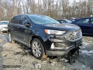 2022 Ford Edge Titanium with VIN 2FMPK4K92NBA52677, listed as a Copart auction lot 88791125 with 76,718 mi miles and Salvage Title. Bid and sale history available at carsss.com. Image 12.