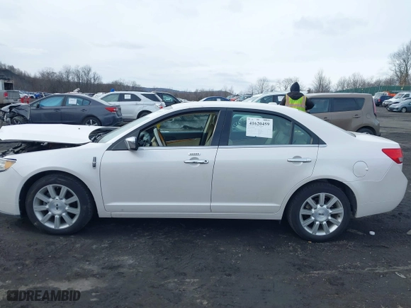 2011 Lincoln MKZ with VIN 3LNHL2GC2BR765716, listed as a IAAI auction lot 41620459 with 122,349 mi miles. Bid and sale history available at carsss.com. Image 14.