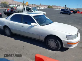 1991 Lexus LS z VIN JT8UF11E5M0073935, wystawiony jako IAAI lot #41633383 z przebiegiem 139 408 mil mil oraz . Historia ofert i sprzedaży dostępna na DreamBid. Obrazek 1.