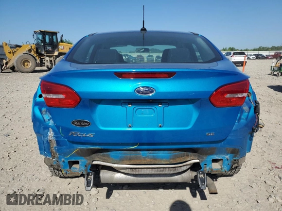 2017 Ford Focus SE z VIN 1FADP3F25HL218829, wystawiony jako Copart lot #63070195 z przebiegiem 64 039 mil mil oraz Czysty tytuł • Clean title. Historia ofert i sprzedaży dostępna na DreamBid. Obrazek 6.