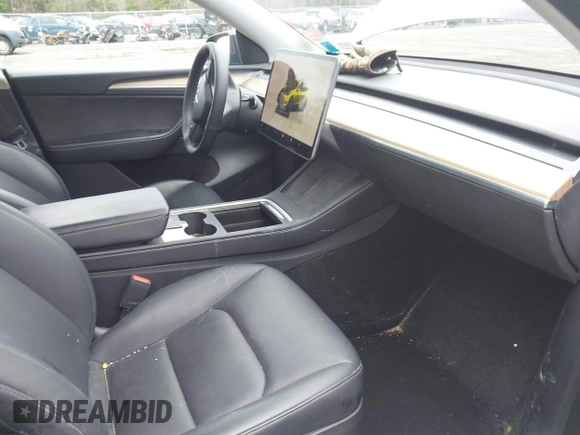 2022 Tesla Model Y Long Range with VIN 7SAYGDEE5NA016892, listed as a IAAI auction lot 41936735 with 69,136 mi miles and . Bid and sale history available at DreamBid. Image 5.