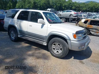 2000 Toyota 4Runner Limited z VIN JT3HN87R3Y0301305, wystawiony jako IAAI lot #42559874 z przebiegiem 194 962 mil mil oraz . Historia ofert i sprzedaży dostępna na DreamBid. Obrazek 1.