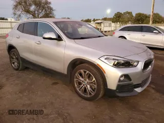 2020 BMW X2 sDrive28i with VIN WBXYH9C09L5P95698, listed as a Copart auction lot 87486094 with 45,319 mi miles and Salvage Title. Bid and sale history available at carsss.com. Image 4.