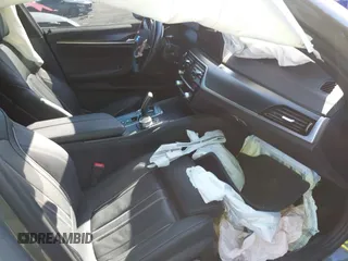 2022 BMW 5 Series M550i xDrive with VIN WBA13BK02NCJ61943, listed as a IAAI auction lot 41607980 with Not provided miles and . Bid and sale history available at DreamBid. Image 5.
