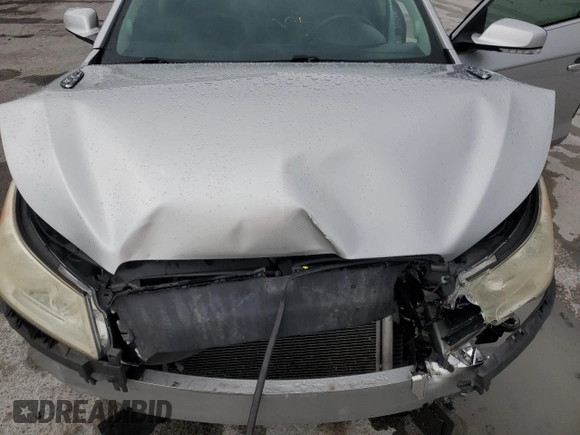 2013 Buick LaCrosse Premium 1 z VIN 1G4GF5E33DF170154, wystawiony jako Copart lot #59536615 z przebiegiem 213 717 mil mil oraz Szkoda całkowita • Salvage title. Historia ofert i sprzedaży dostępna na DreamBid. Obrazek 11.
