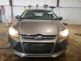 2014 Ford Focus Titanium z VIN 1FADP3N27EL462950, wystawiony jako Copart lot #65207155 z przebiegiem 34 058 mil mil oraz Szkoda całkowita • Salvage title. Historia ofert i sprzedaży dostępna na DreamBid. Obrazek 5.