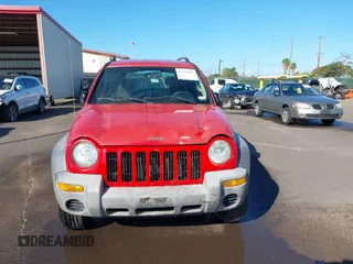 2004 Jeep Liberty Sport with VIN 1J4GL48K04W326252, listed as a IAAI auction lot 41479037 with 168,994 mi miles. Bid and sale history available at carsss.com. Image 12.