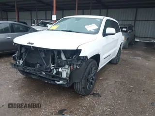 2018 Jeep Grand Cherokee Altitude with VIN 1C4RJFAG4JC320599, listed as a IAAI auction lot 42182661 with 70,957 mi miles and . Bid and sale history available at DreamBid. Image 17.