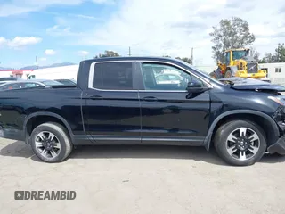 2020 Honda Ridgeline RTL with VIN 5FPYK3F53LB030107, listed as a IAAI auction lot 41933517 with 93,373 mi miles and . Bid and sale history available at DreamBid. Image 13.