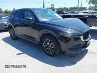 2017 Mazda CX-5 Grand Touring with VIN JM3KFBDL6H0200830, listed as a IAAI auction lot 42005145 with 90,510 mi miles. Bid and sale history available at carsss.com. Image 1.