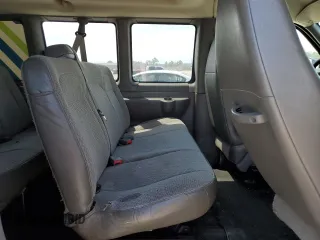 2013 Chevrolet Express Passenger LT z VIN 1GAZG1FG0D1167528, wystawiony jako Copart lot #53741965 z przebiegiem 103 253 mil mil oraz Szkoda całkowita • Salvage title. Historia ofert i sprzedaży dostępna na DreamBid. Obrazek 11.