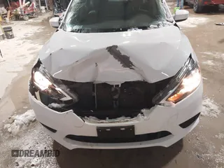 2019 Nissan Sentra S z VIN 3N1AB7APXKY240431, wystawiony jako IAAI lot #41722182 z przebiegiem 81 450 mil mil oraz . Historia ofert i sprzedaży dostępna na DreamBid. Obrazek 12.