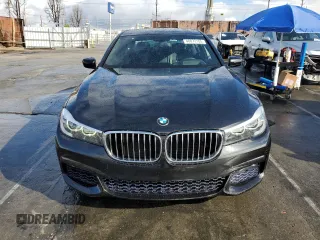 2017 BMW 7 Series 740i with VIN WBA7E2C59HG739788, listed as a Copart auction lot 48073105 with 36,274 mi miles and Salvage Title. Bid and sale history available at carsss.com. Image 5.